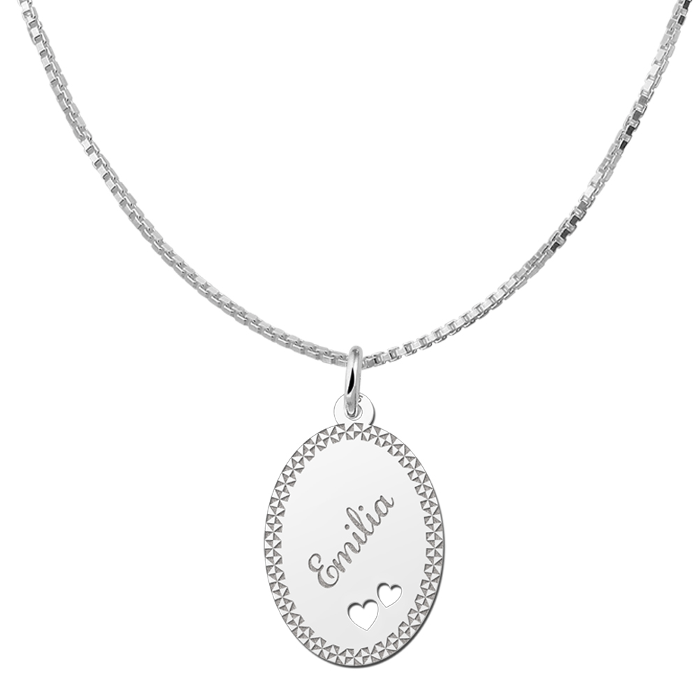 Silver oval pendant border & two hearts