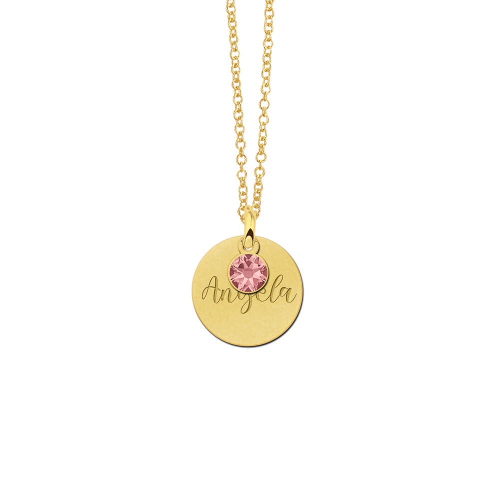 Golden pendant with hanging swarovski stone