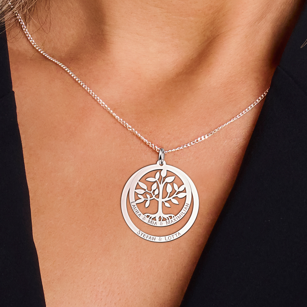 Silver round family pendant with tree of life
