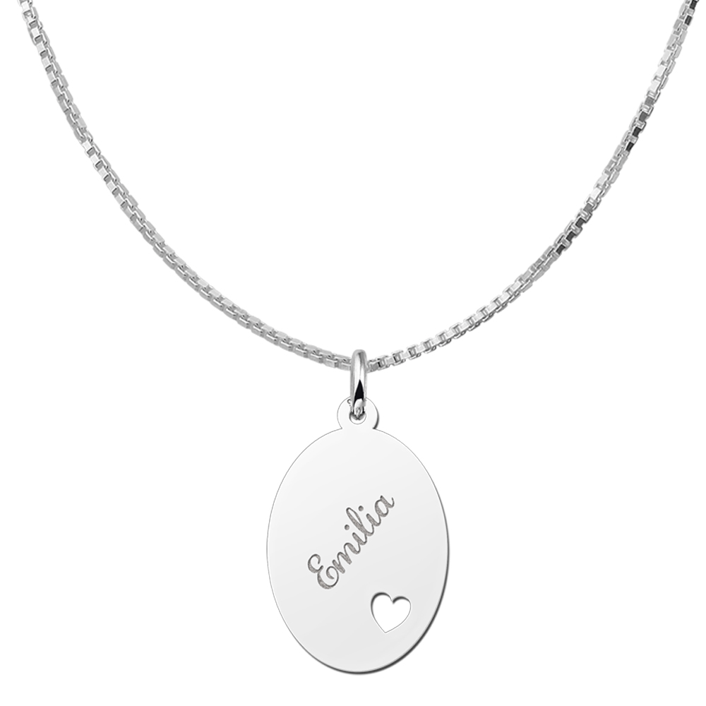 Silver oval pendant with heart