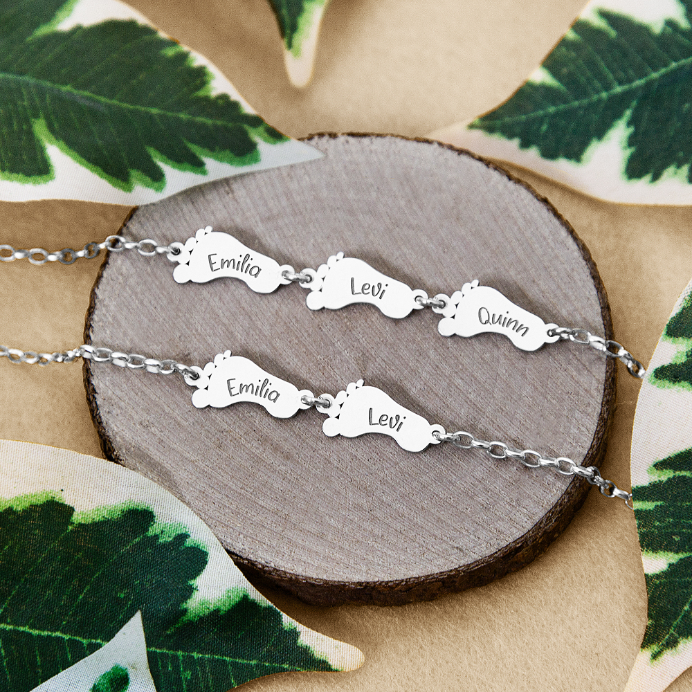 Silver bracelet with baby feet