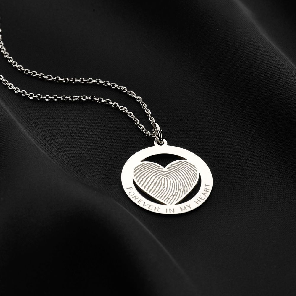 Silver fingerprint heart pendant circled