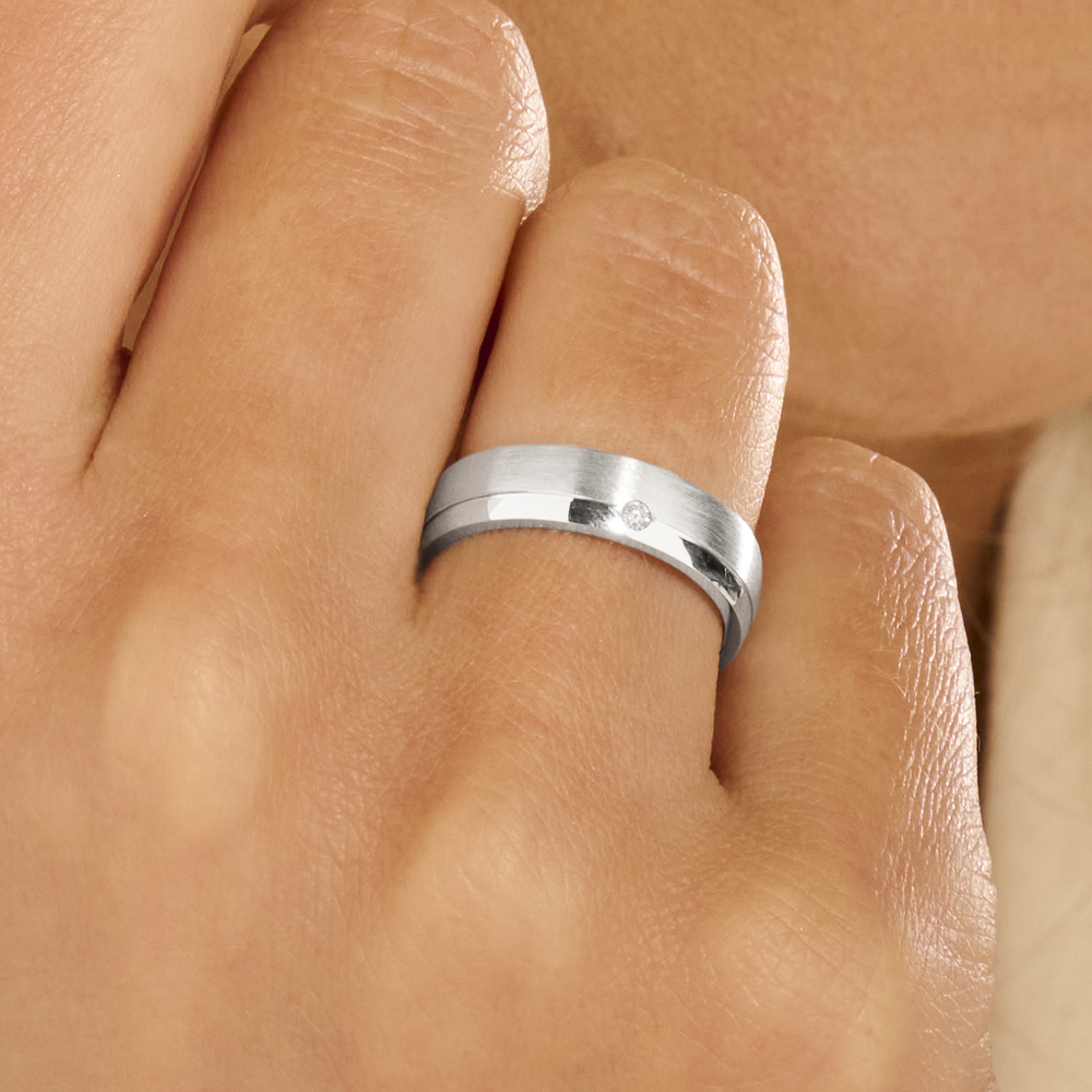 Silver brushed couples rings with polished side and cubic zirconia