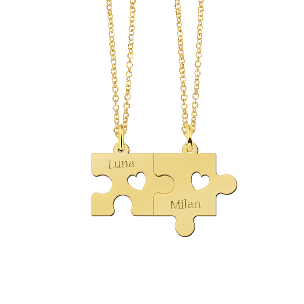 Gold plated puzzle piece breakable pendant with cut-out heart and names