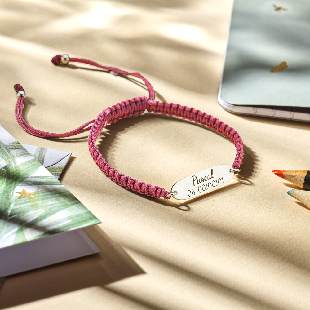 Silver kids bracelet with name and phonenumber pink