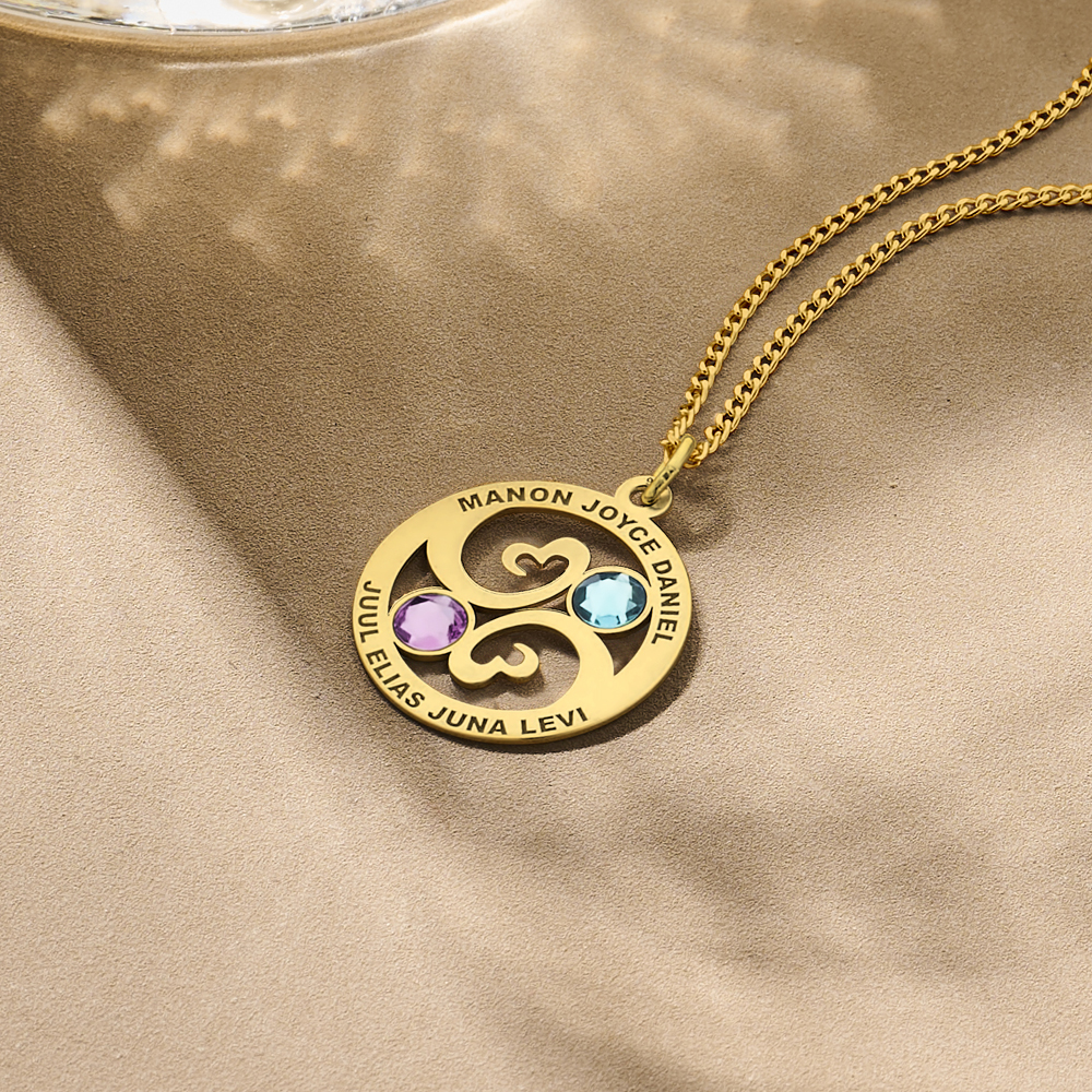 Family pendant with stones in gold