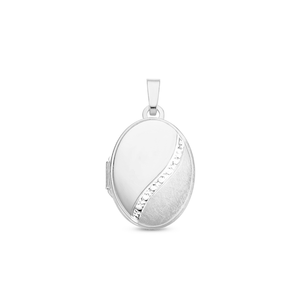 Silver oval medallion with decorative line