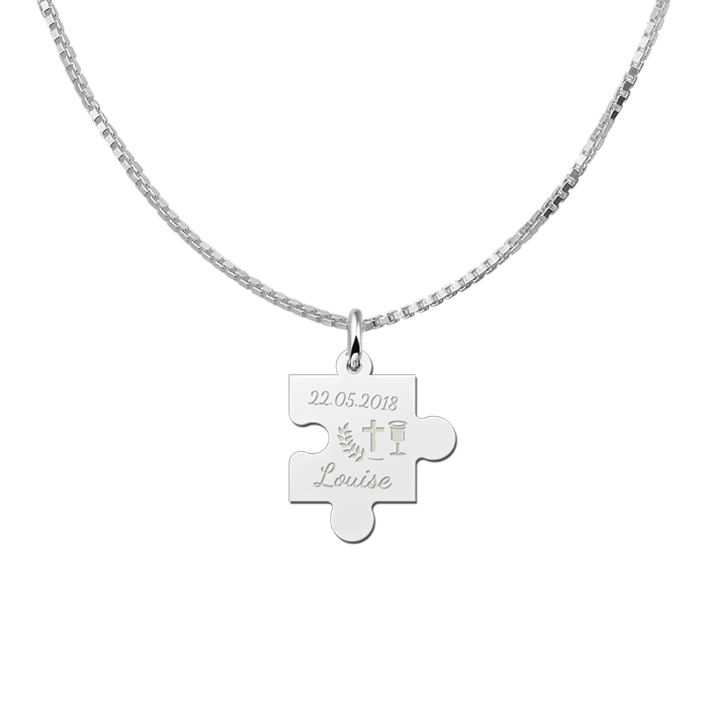 Silver pendant puzzle piece