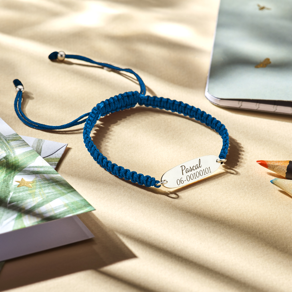 Silver kids bracelet with name and phonenumber blue