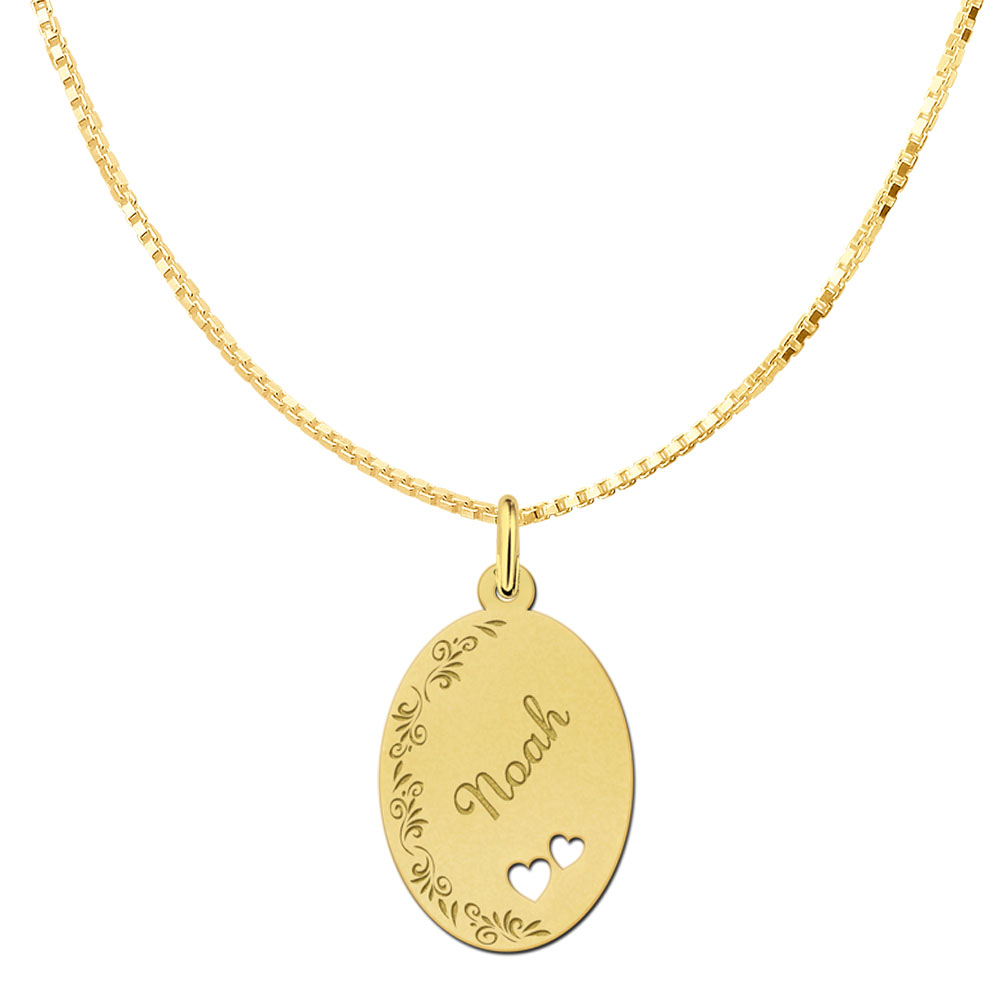 Gold-plated oval pendant with floral border and two hearts