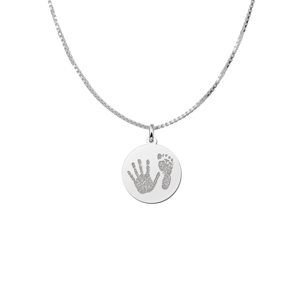 Silver round handprint pendant