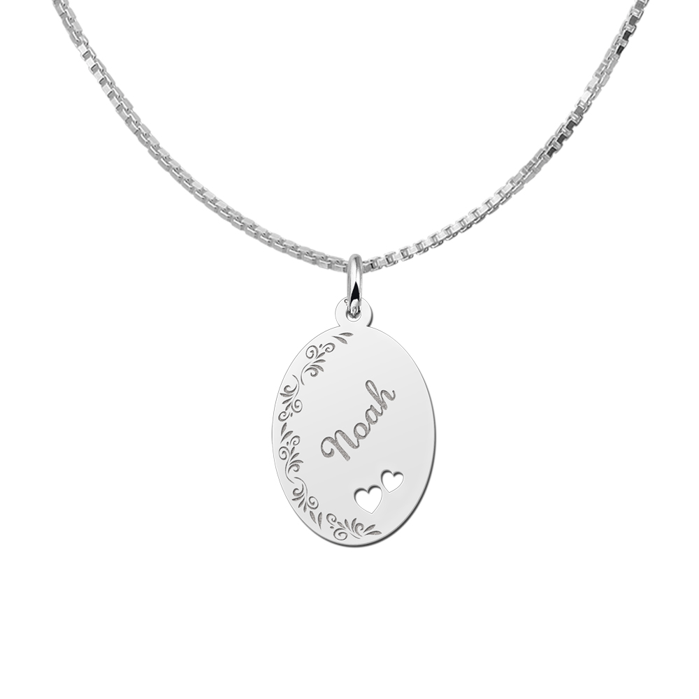 Silver oval pendant floral border & two hearts