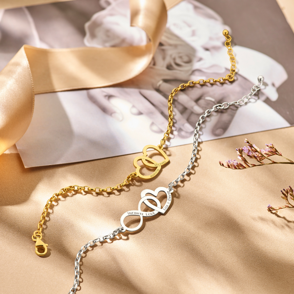 14k gold bracelet with two linked hearts and names