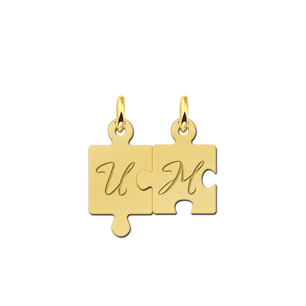 Gold plated puzzle piece pendants with initials