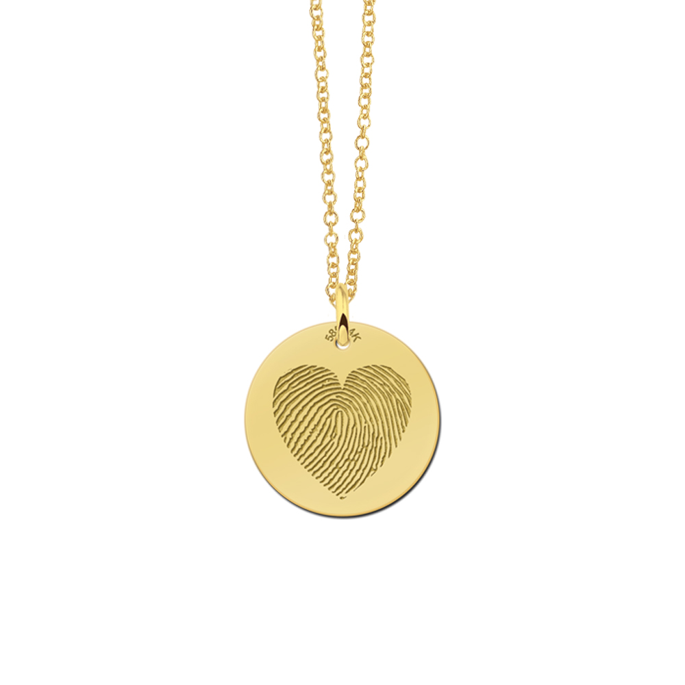 Golden pendant with fingerprint in heart shape