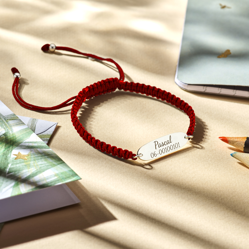 Silver kids bracelet with name and phonenumber red