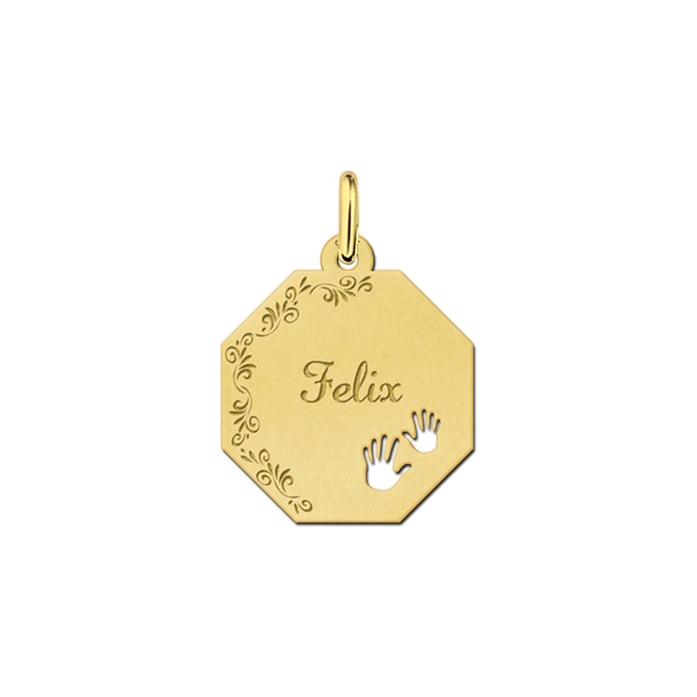 Gold-plated octagonal pendant with floral border and baby hands